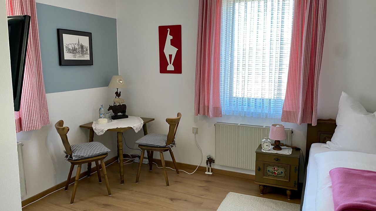 Ferienwohnung Wendelstein Schlafzimmer mit Sitzecke Ferienwohnung Wendelstein Schlafzimmer mit Sitzecke